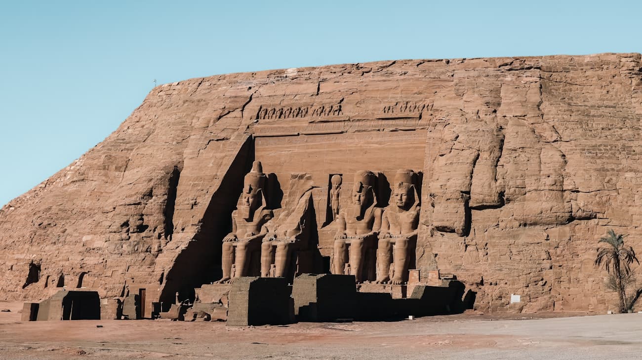 The rock cut facade and colossal statues of Abu Simbel