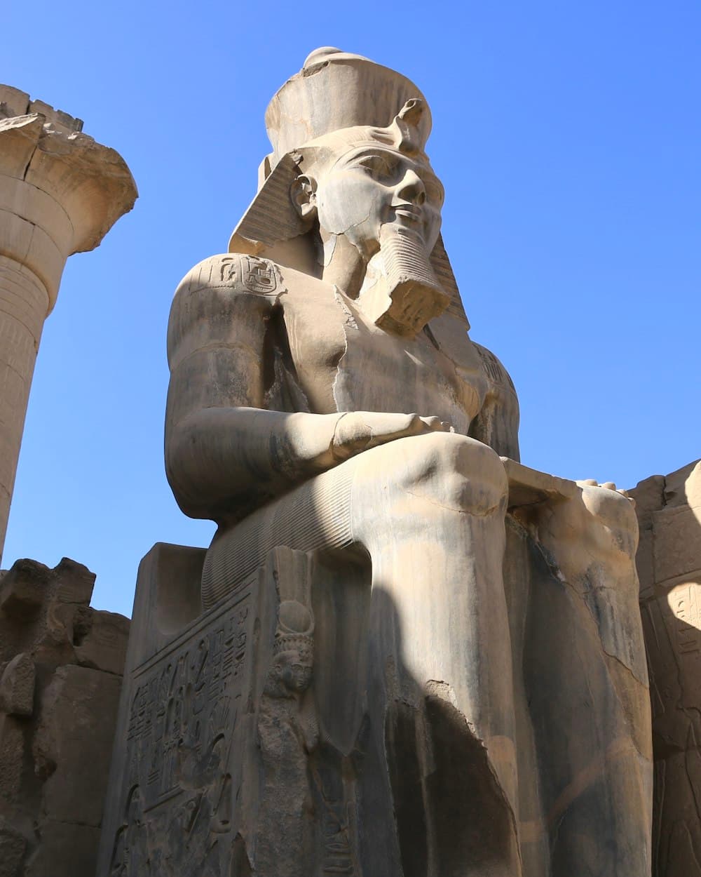 Colossal seated statue of Ramses II at Luxor Temple